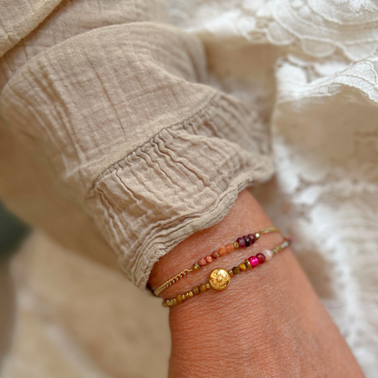 Granaat en zonnesteen armband